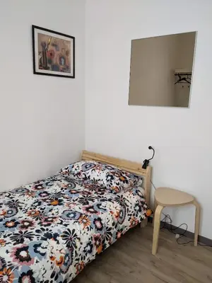 Letto o letti in una camera di In the center of Modena, Piazza Roma and the Ferrari Museum