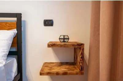Letto o letti in una camera di Fenili Belasi - apartamento nuovo
