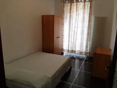 Letto o letti in una camera di casa Nadia