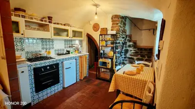 Cucina o angolo cottura di the little house of arcola in the medieval walls