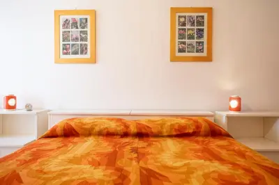 Letto o letti in una camera di 279B - Casa Maria Grazia, nel centro di Sestri, 10 minuti a piedi dalla Baia del Silenzio
