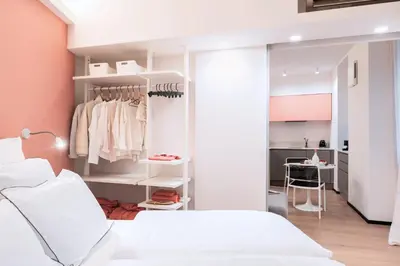 Letto o letti in una camera di Vico del Pozzo Luxury Apartment - Fuga romantica nel cuore di Rapallo