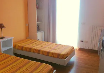 Letto o letti in una camera di Villa Mari - Collina Sestri Levante Splendida vista