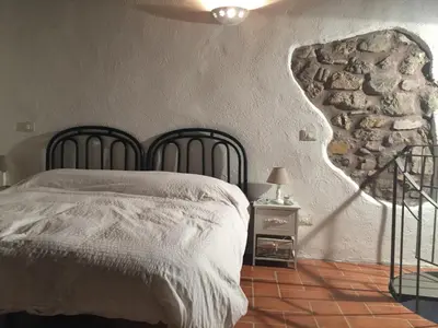 Letto o letti in una camera di Ca di Rosa