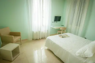 Letto o letti in una camera di Hotel Villa Maranello