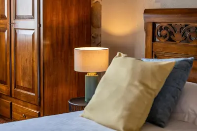 Letto o letti in una camera di Relais Corte Baruzzo