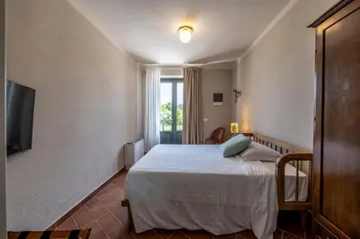 Letto o letti in una camera di Relais Corte Baruzzo