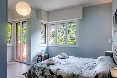 Letto o letti in una camera di La Casa nel Verde - Box auto e Wi-Fi