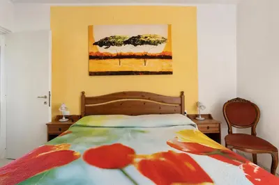 Letto o letti in una camera di Appartamenti La Fortezza
