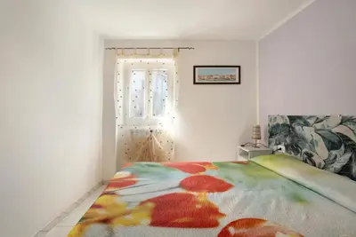 Letto o letti in una camera di Appartamenti La Fortezza