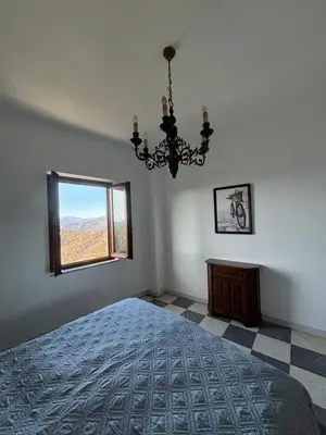 Letto o letti in una camera di Basilico Apartment with stunnung views