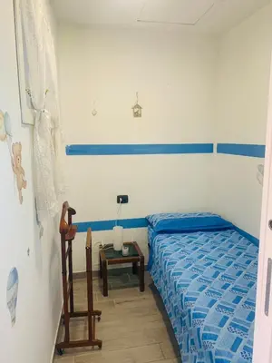 Letto o letti in una camera di La Casetta di Nico