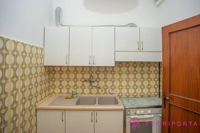 Cucina o angolo cottura di FuoriPorta Affitti Brevi - Giovenale Grande