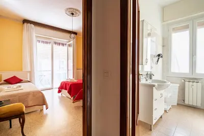 Letto o letti in una camera di GuestHost - Casa Bina