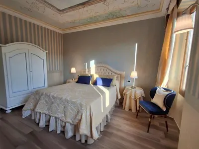 Letto o letti in una camera di E R Suite