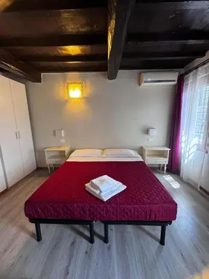 Letto o letti in una camera di Villa Cittadella