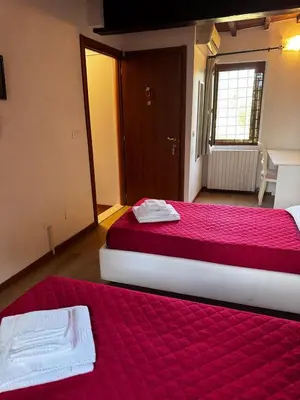 Letto o letti in una camera di Villa Cittadella