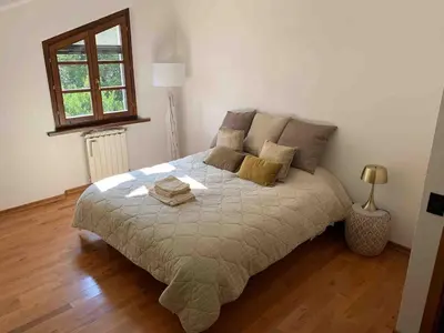 Letto o letti in una camera di Nido di Luna