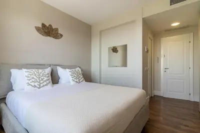 Letto o letti in una camera di Villa Amaranta - mytouristhome