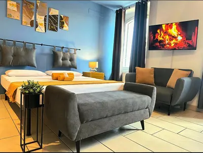 Letto o letti in una camera di appartamento Lucia