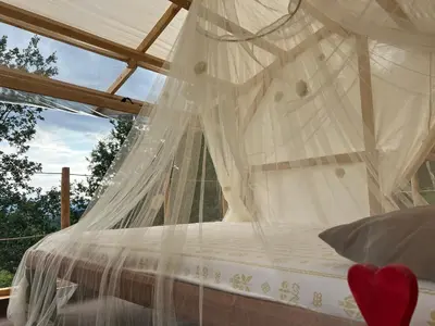 Letto o letti in una camera di La casetta delle stelle - relax e riservatezza a 550m di quota