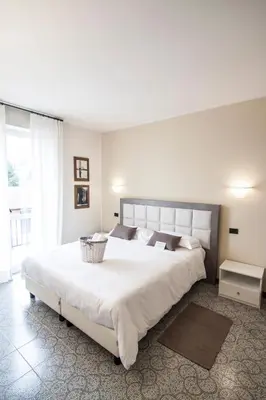 Letto o letti in una camera di Hotel Le Vigne di Corvino