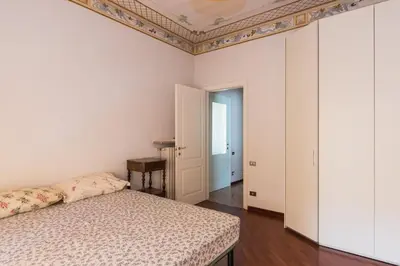 Letto o letti in una camera di Pit Stop MotorValley - Near Modena Old Town