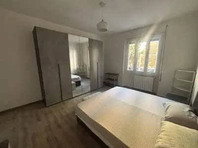 Letto o letti in una camera di Appartamento Primavera