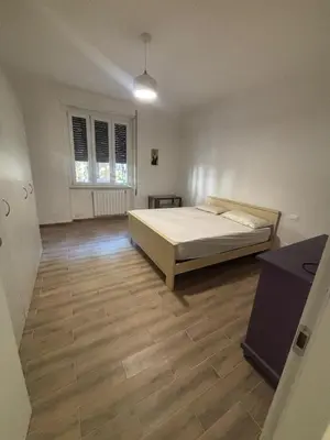 Letto o letti in una camera di Appartamento Primavera
