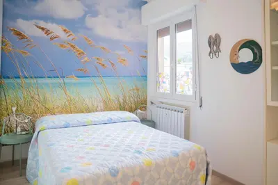 Letto o letti in una camera di 073C - Casa Rapallo con Attico privato, 10 minuti dal Mare Spiaggie a piedi