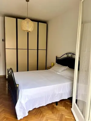 Letto o letti in una camera di Sun Apartment Rapallo