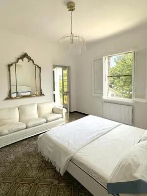 Letto o letti in una camera di La Villa delle Rose