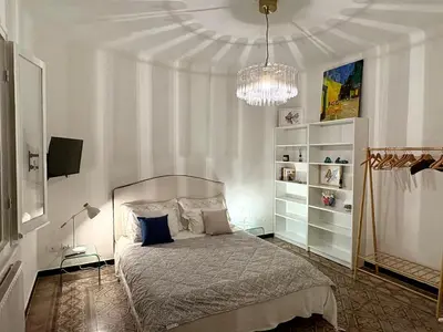 Letto o letti in una camera di La Villa delle Rose