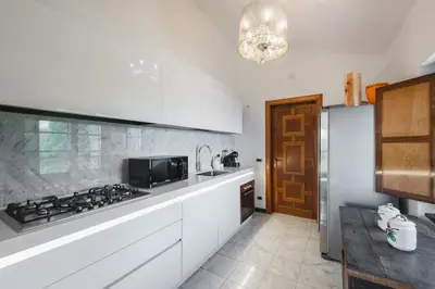 Cucina o angolo cottura di Villa with Pool - Unique Sea View - Free Parking