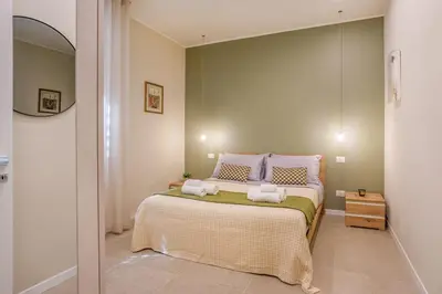 Letto o letti in una camera di Urban Eden Nest - Smart Oasis in the Motor Valley