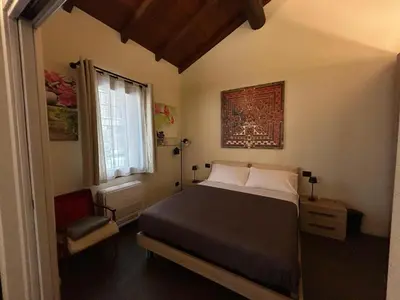 Letto o letti in una camera di La Falegnameria