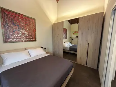 Letto o letti in una camera di La Falegnameria