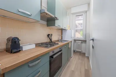 Cucina o angolo cottura di 2 Min dal Bus per CNAO e Policlinico San Matteo - Parcheggio facile, Aria Condizionata