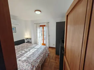 Letto o letti in una camera di Casa Le Rondini