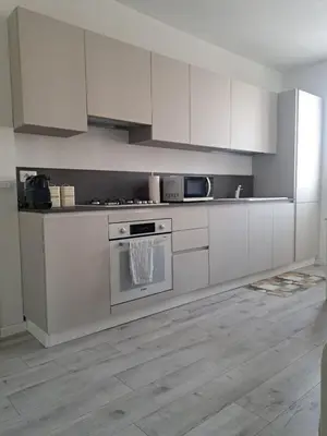 Cucina o angolo cottura di L'Aldina - intero appartamento 2 camere ristrutturato Top a 2 passi dal centro