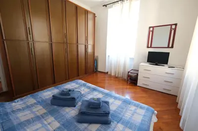 Letto o letti in una camera di A Un Soffio dal Mare by PortofinoVacanze