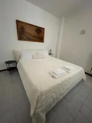 Letto o letti in una camera di Casa Aurora