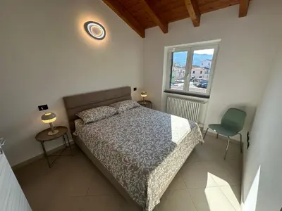 Letto o letti in una camera di La chicca del Vara