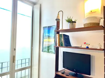 TV o dispositivi per l'intrattenimento presso Bilocale atelier in centro storico