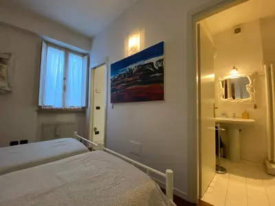 Letto o letti in una camera di Bilocale atelier in centro storico
