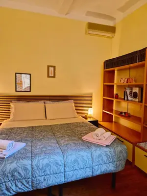Letto o letti in una camera di Quiet Tortellini