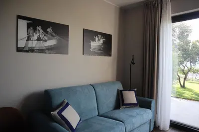 Area soggiorno di La Giulia Suites like Home