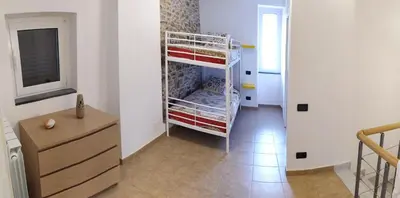 Letto o letti in una camera di Casetta Rosa