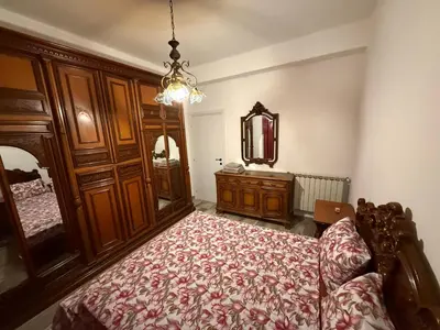 Letto o letti in una camera di Casa Bianca