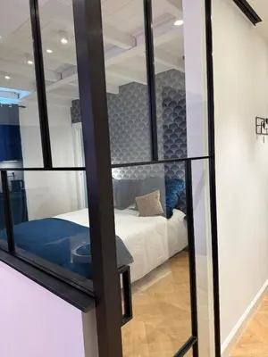 Letto o letti in una camera di Riviera Luxe Glam